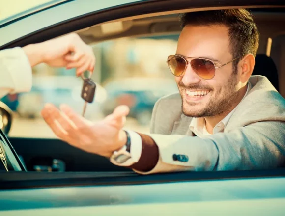 Man taking car key 3 Things to Know About Selling Luxury Vehicles After Auto Sales College
